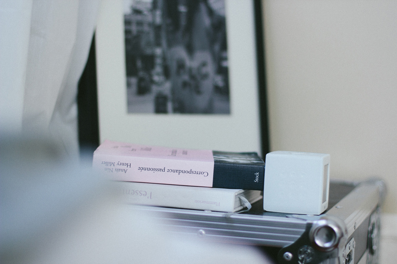 Books on bedside table by Conscious by Chloé