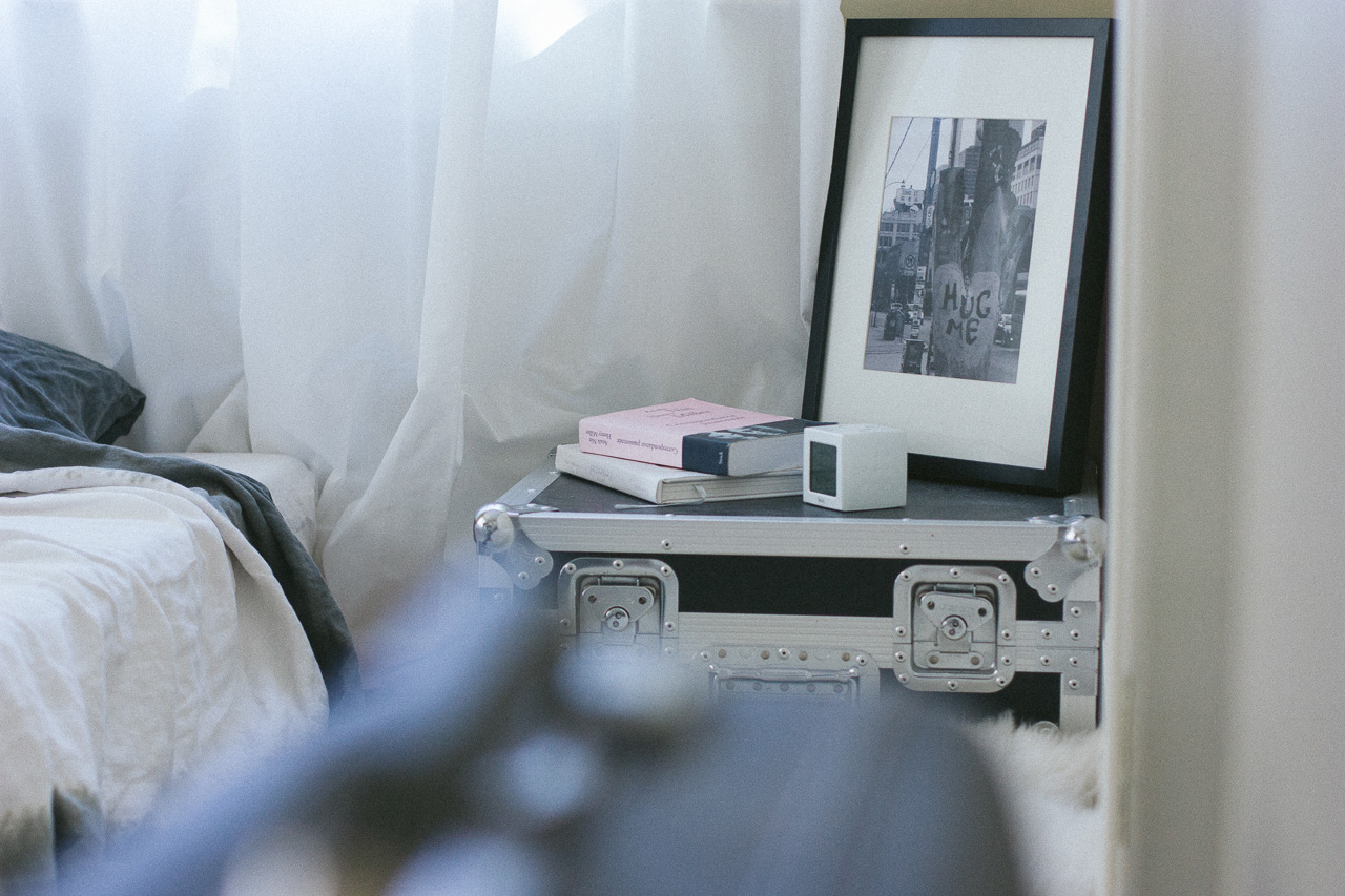 Books on bedside table by Conscious by Chloé