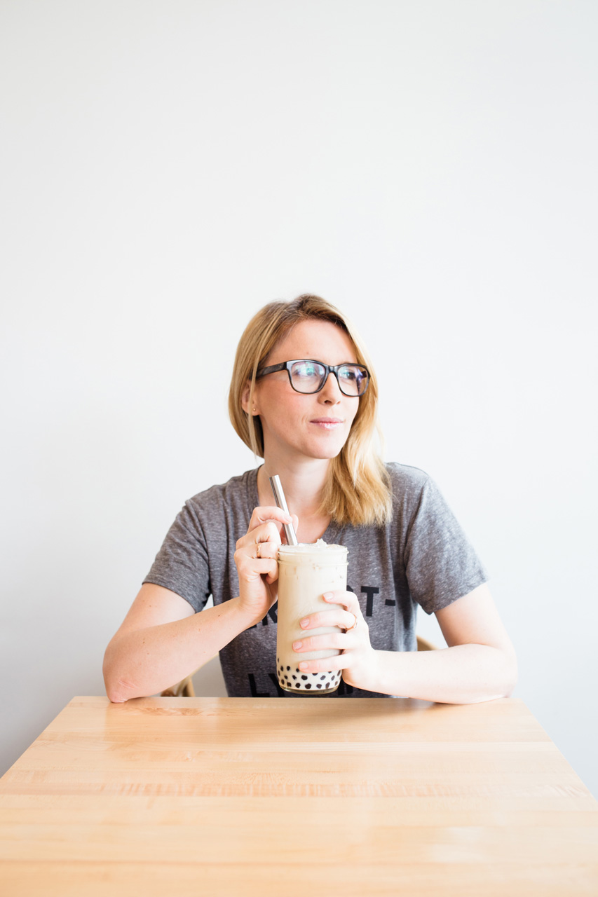 Chloé at Tea Bar PDX drinking bubble tea out of her mason jar with her reusable straw by Candace Molatore​ for Conscious by Chloé