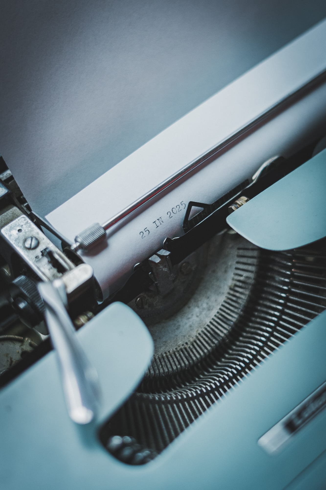 25 in 2025 typed on a piece of paper on a typewriter
