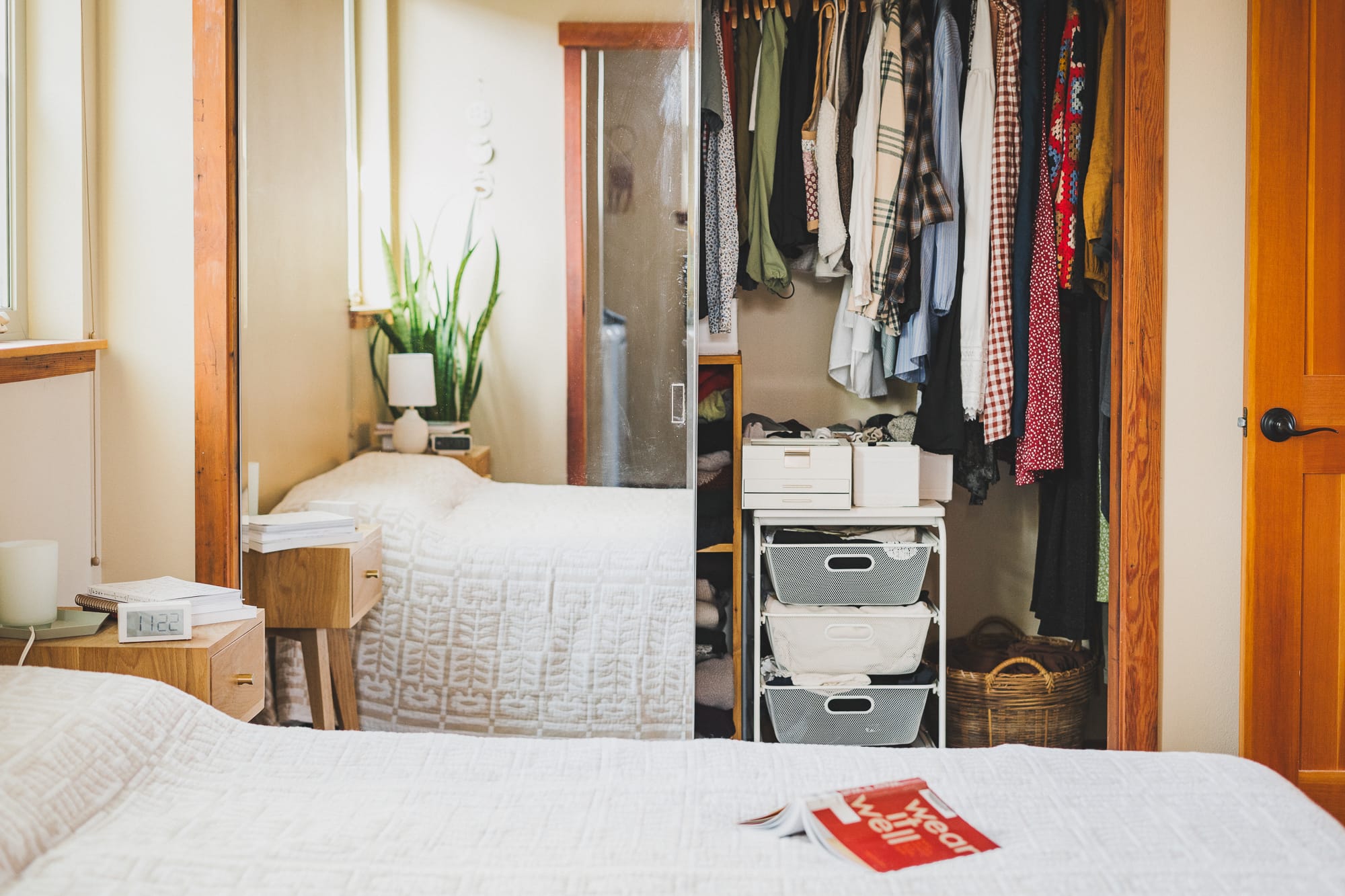 Wear It Well by Allison Bornstein on a bed in front of a closet