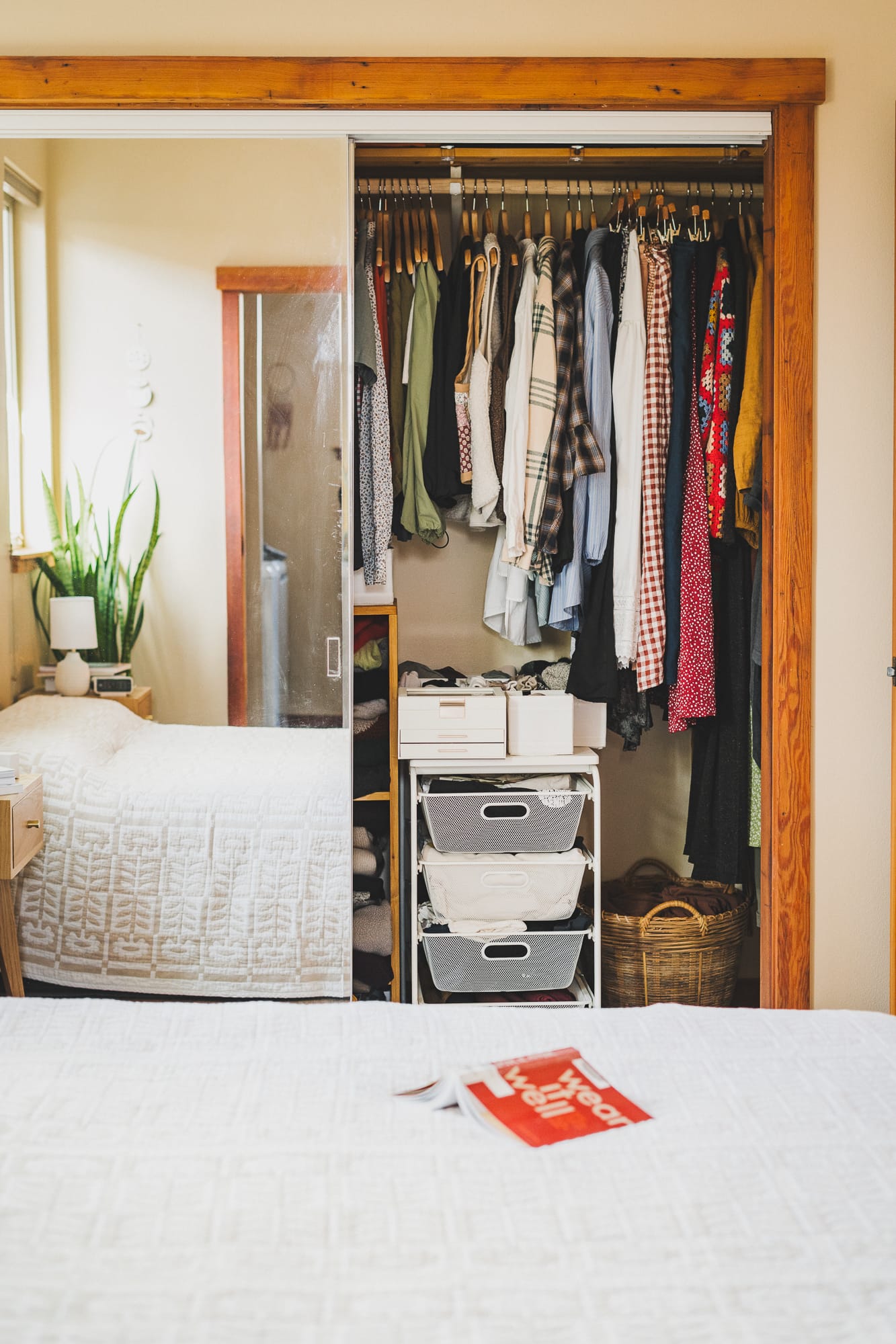 Wear It Well by Allison Bornstein on a bed in front of a closet